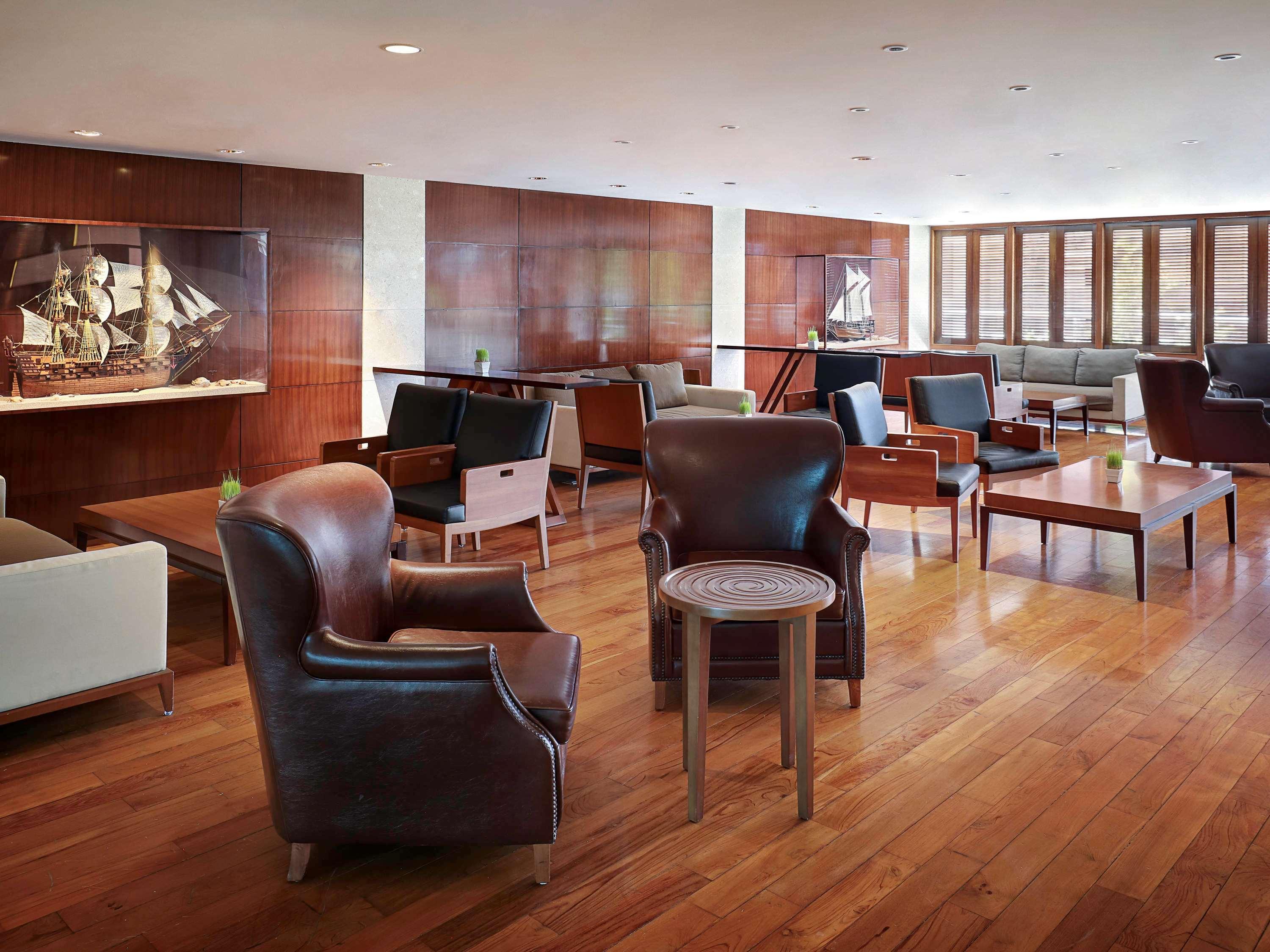 库塔海滩遗产酒店 - 由雅高酒店集团管理 庫塔 外观 照片 The Club lounge at San Francisco International Airport
