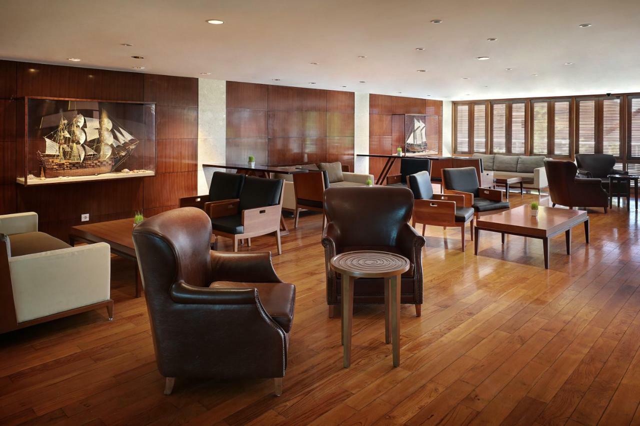 库塔海滩遗产酒店 - 由雅高酒店集团管理 庫塔 外观 照片 The Club lounge at San Francisco International Airport